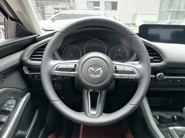 Mazda Axela — Фото автомобиля 15
