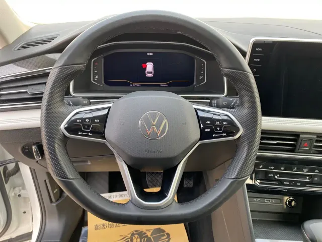 Volkswagen Tiguan L — Фото автомобиля 8