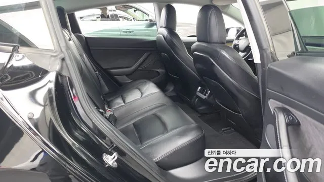 Tesla Model 3 — Фото автомобиля 18