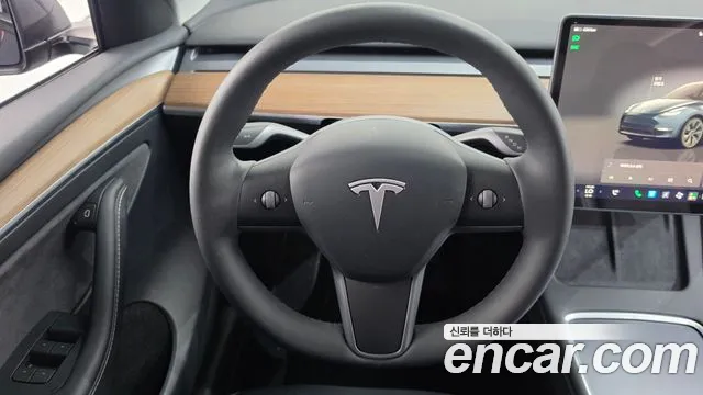 Tesla Model Y — Фото автомобиля 14