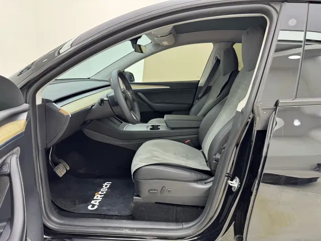 Tesla Model Y — Фото автомобиля 9