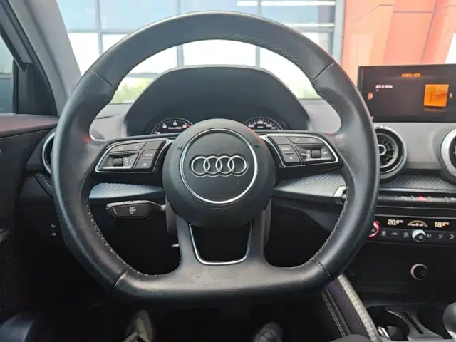 Audi Q2L — Фото автомобиля 10
