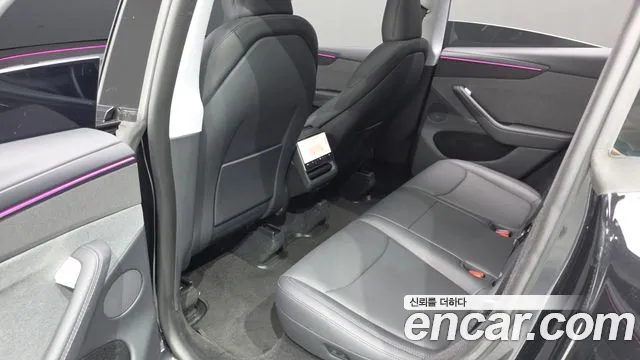 Tesla Model Y — Фото автомобиля 16