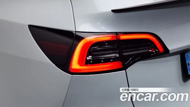 Tesla Model Y — Фото автомобиля 6