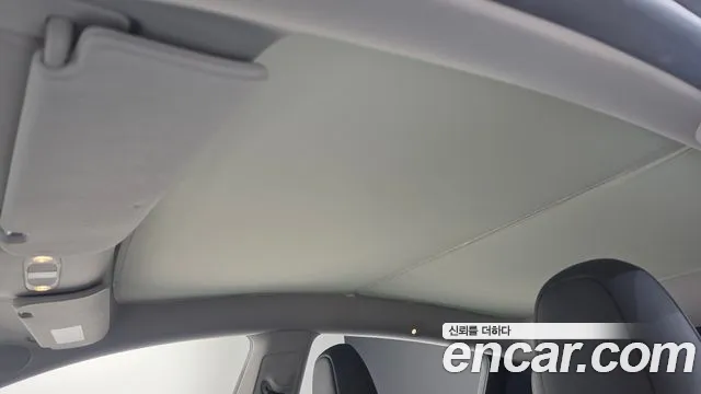 Tesla Model Y — Фото автомобиля 21