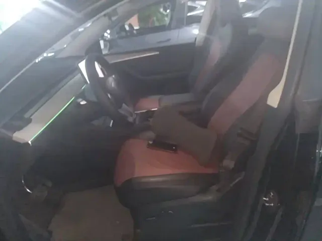 Tesla Model Y — Фото автомобиля 14