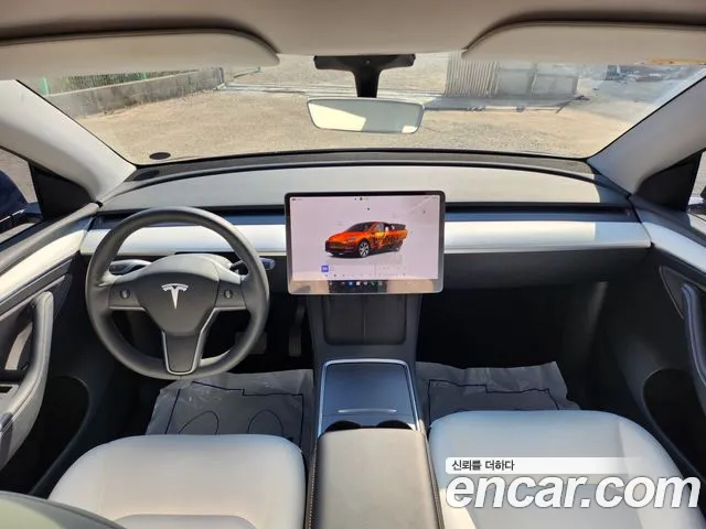 Tesla Model Y — Фото автомобиля 7