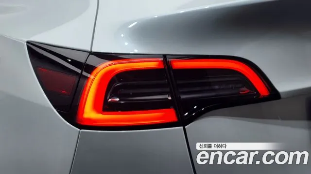 Tesla Model Y — Фото автомобиля 8