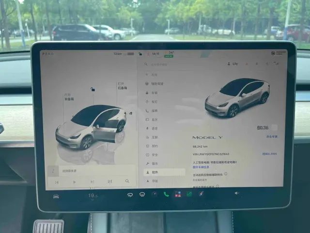 Tesla Model Y — Фото автомобиля 14