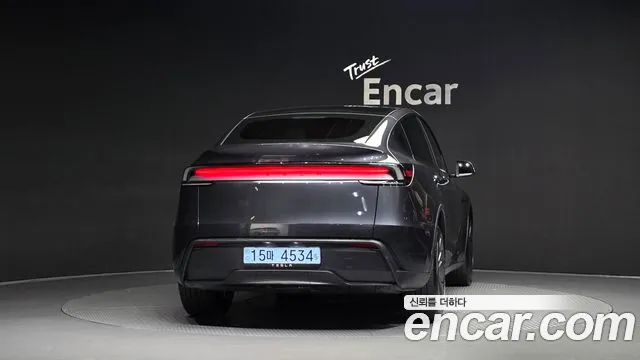 Tesla Model Y — Фото автомобиля 4