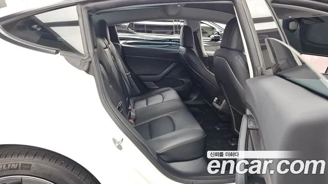 Tesla Model 3 — Фото автомобиля 18