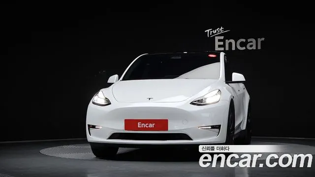 Tesla Model Y — Фото автомобиля 3