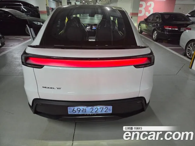 Tesla Model Y — Фото автомобиля 7