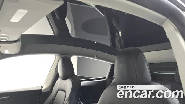 Tesla Model Y — Фото автомобиля 23