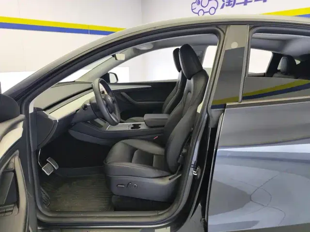Tesla Model Y — Фото автомобиля 9