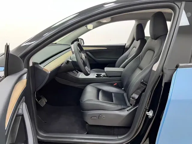 Tesla Model Y — Фото автомобиля 7