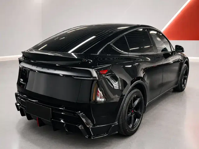 Tesla Model Y — Фото автомобиля 4