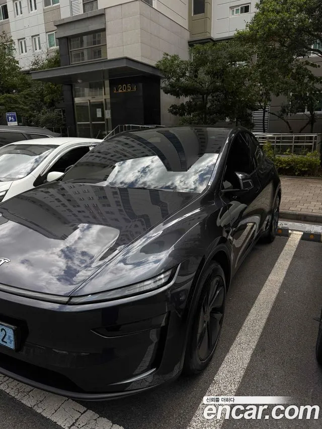 Tesla Model Y — Фото автомобиля 5