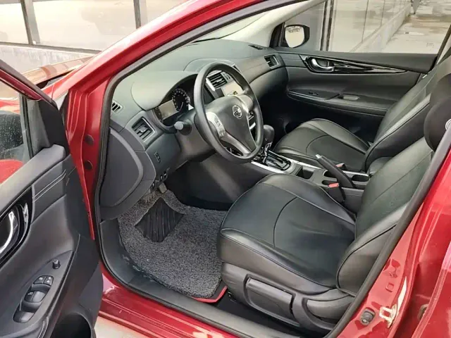 Nissan Tiida — Фото автомобиля 15