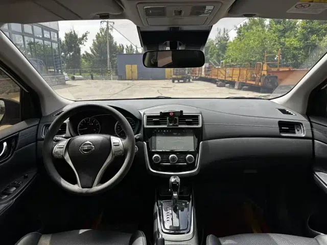 Nissan Tiida — Фото автомобиля 11