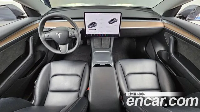Tesla Model 3 — Фото автомобиля 10
