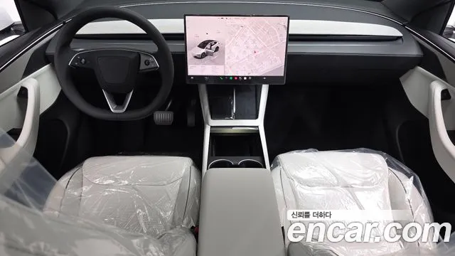 Tesla Model Y — Фото автомобиля 6