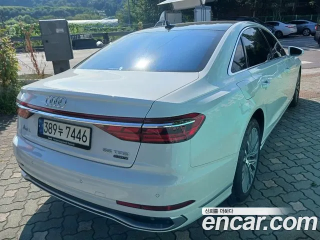 Audi A8 55 TFSI quattro Premium LWB — Фото автомобиля 4