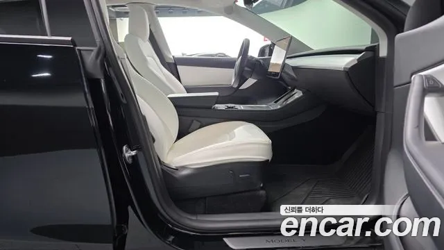 Tesla Model Y — Фото автомобиля 16