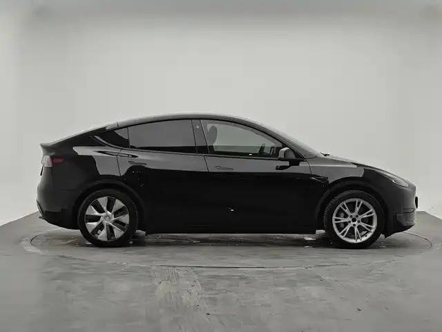 Tesla Model Y — Фото автомобиля 4