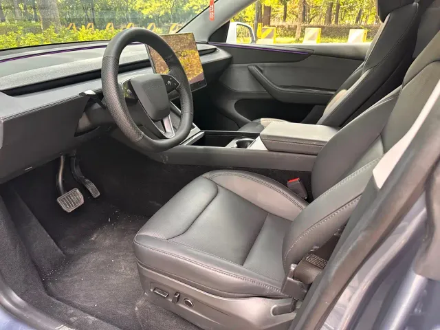 Tesla Model Y — Фото автомобиля 16