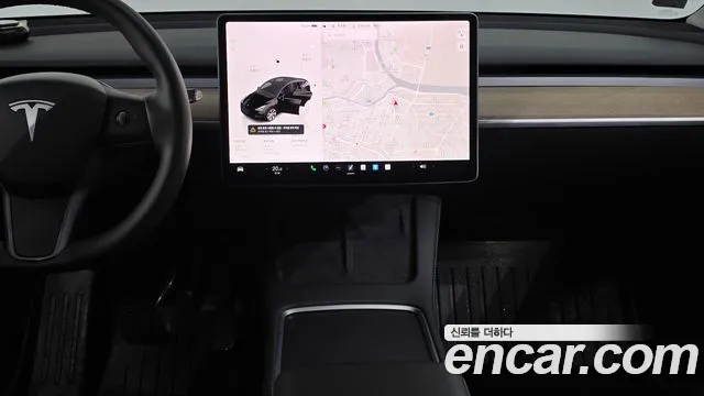 Tesla Model Y — Фото автомобиля 14