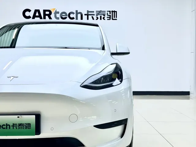 Tesla Model Y — Фото автомобиля 6