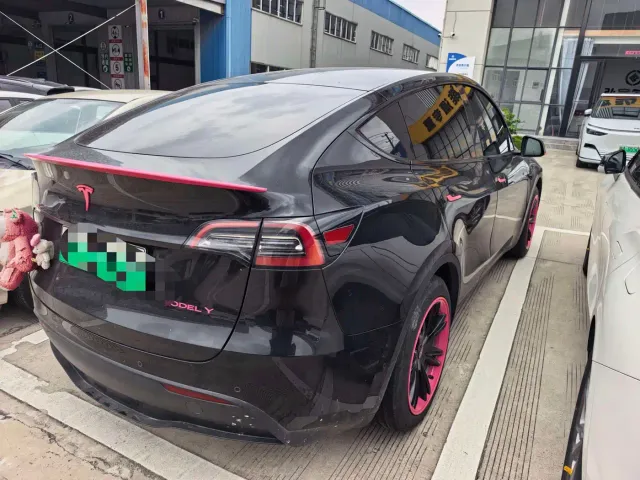 Tesla Model Y — Фото автомобиля 7