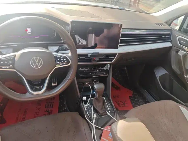 Volkswagen Tiguan L — Фото автомобиля 12