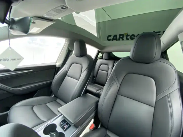Tesla Model Y — Фото автомобиля 28