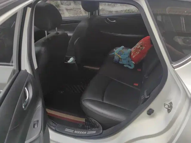 Nissan Tiida — Фото автомобиля 11
