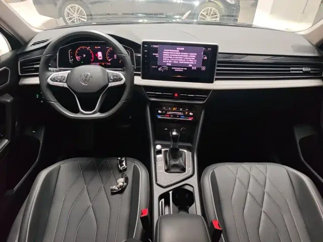 Volkswagen Tiguan L — Фото автомобиля 9