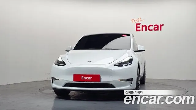 Tesla Model Y — Фото автомобиля 3