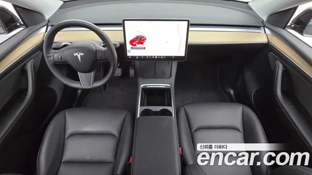 Tesla Model Y — Фото автомобиля 7