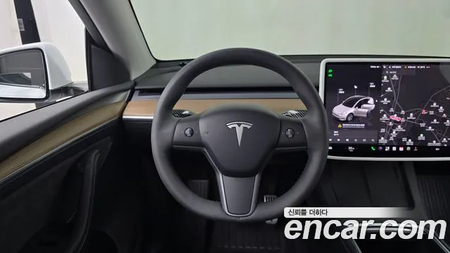Tesla Model Y — Фото автомобиля 13