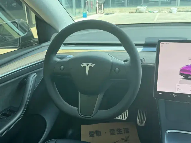 Tesla Model Y — Фото автомобиля 11