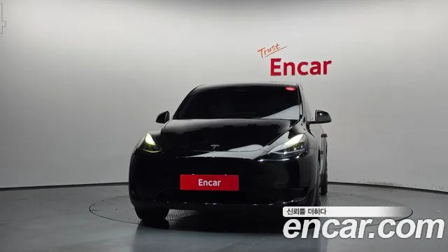 Tesla Model Y — Фото автомобиля 3