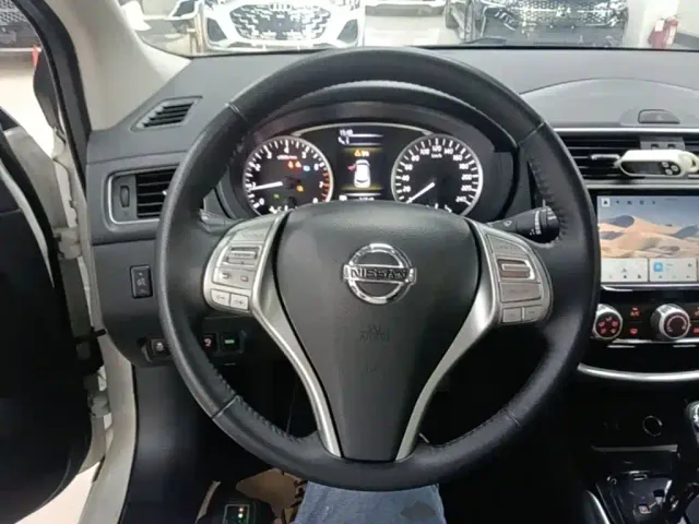 Nissan Tiida — Фото автомобиля 10