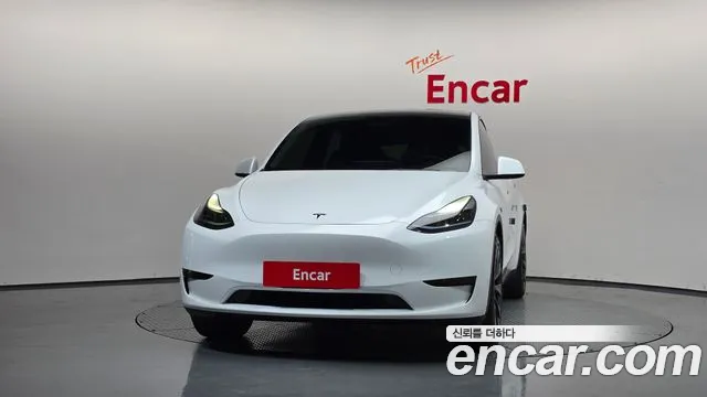 Tesla Model Y — Фото автомобиля 3