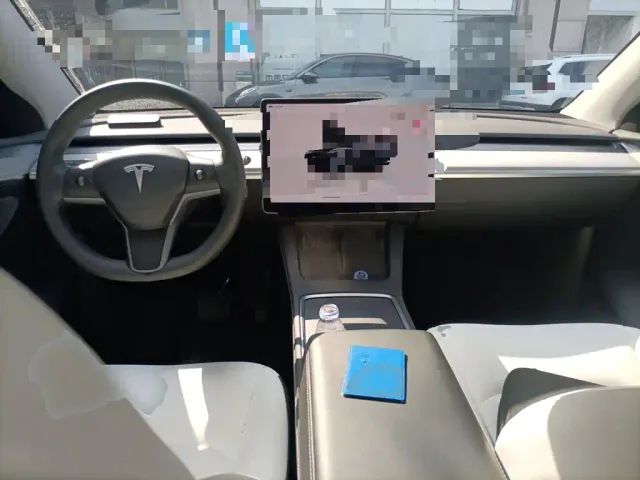 Tesla Model Y — Фото автомобиля 10