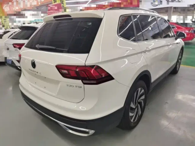 Volkswagen Tiguan L — Фото автомобиля 6