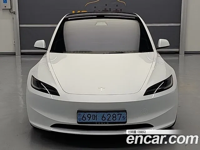 Tesla Model 3 — Фото автомобиля 2