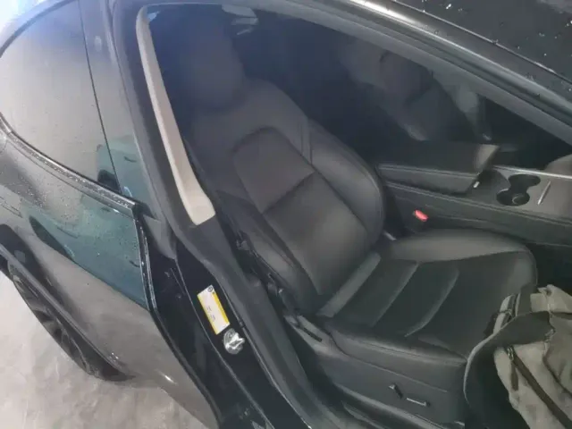 Tesla Model Y — Фото автомобиля 19