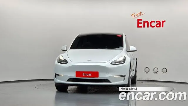 Tesla Model Y — Фото автомобиля 3