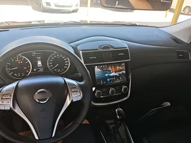 Nissan Tiida — Фото автомобиля 9